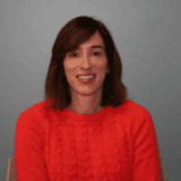 picture of a lady wearing a knitted sweater