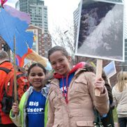 big and little sister at one earth, one climate rally