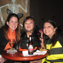 girls in costumes together at a halloween event